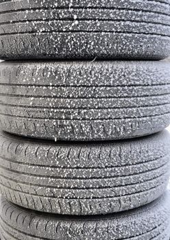 a stack of frozen tires