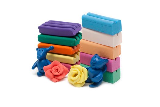 Plasticine of the toy and plates, varicoloured homemade articles