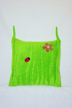 Well decorated handmade green pillow