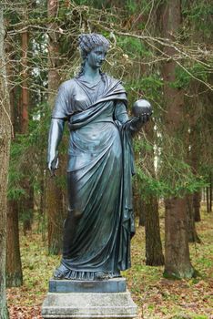 Statue of the muse of poetry in park of Pavlovsk, Saint-Petersburg, Russia