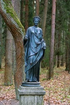 Statue of the muse of poetry in park of Pavlovsk, Saint-Petersburg, Russia