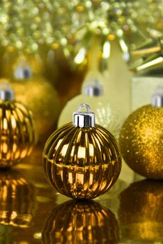 Golden christmas ornaments with star background