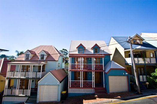 Row of homes with many colours. 