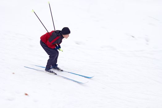 Boy skiing on the mountain ski resort