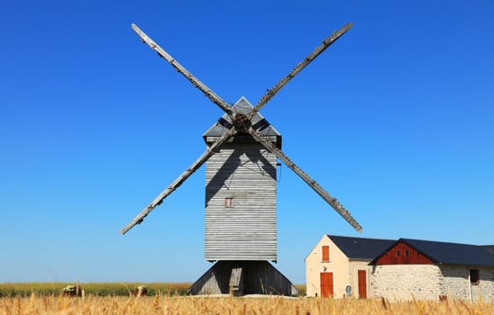 Traditional wooden windmill in the Eure&Loir region of France.This windmill is "The big windmill from Ouarville".