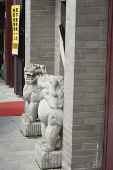 Chinese lion guarding an entrance