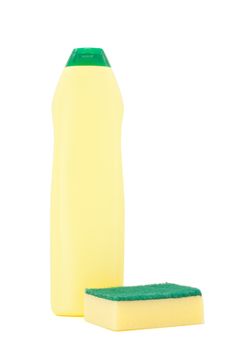 A yellow and green bottle of cleaning product and a yellow and green scouring pad.