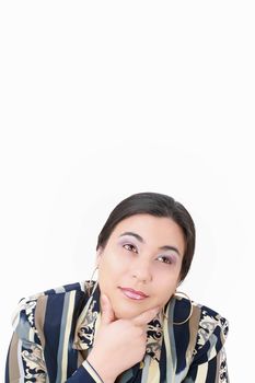 thoughtful woman looking up isolated over white background