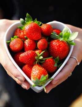 strawberries in heart shape bowl