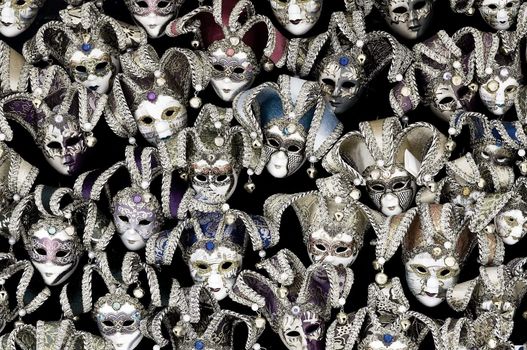 Big amount of traditional venetian carnival masks. Venice, Italy.