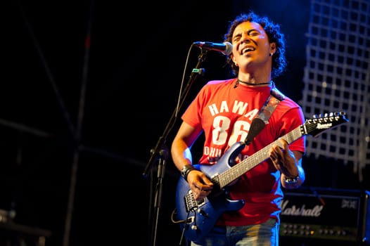 CANARY ISLANDS - SEPTEMBER 30: Guitarist Efren Guerrero from the band Ni Un Pelo De Tonto during Heineken Music Fest September 30, 2011 in Las Palmas, Canary Islands, Spain
