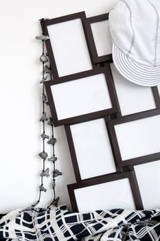 Black and white clothing and photo frames with copy space. 