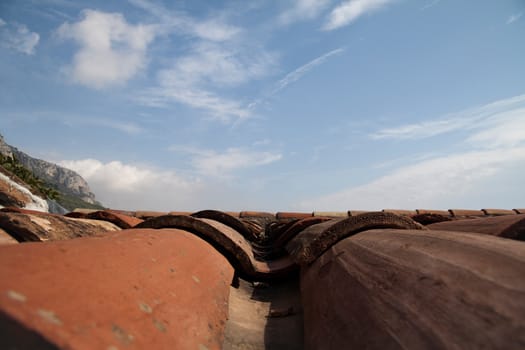 A artistic view of red clay roof tiles