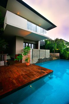 Modern Home surrounded by a pool 