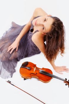 Violin player posing. Isolated over white background