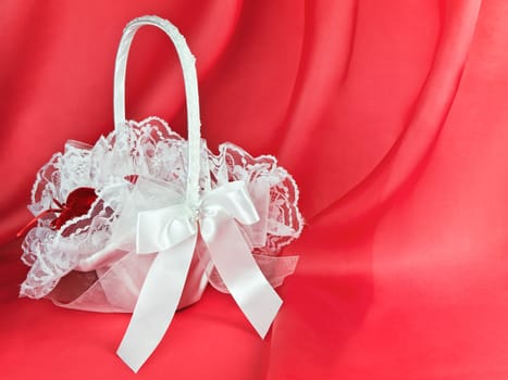 Bridal flower basket over the pink background