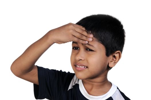 an handsome young indian kid thinking about something