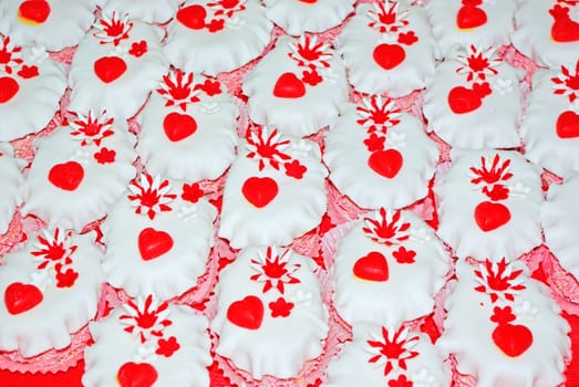 Cakes decorated with little red hearts