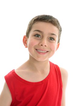 Face of a beautiful smiling young boy 6 years old.  He is wearing a red tank top.  White background.