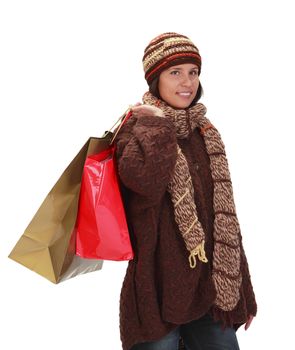 Young woman with shopping bags over her shoulder.