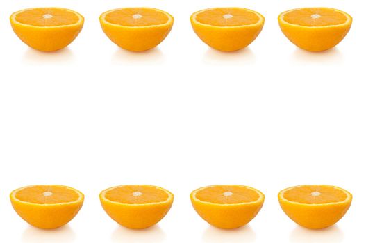 Eight small orange halves arranged in horizontal lines along the bottom and top of the image and over white.