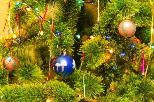 Beautiful Christmas fur-tree decorated with New Year's toys