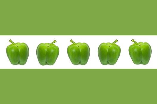 A horizontal white border accross the centre of a green image containing five small green bell peppers.