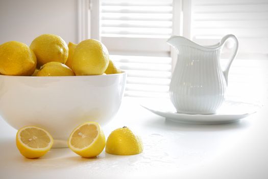 Lemons in large bowl on table
