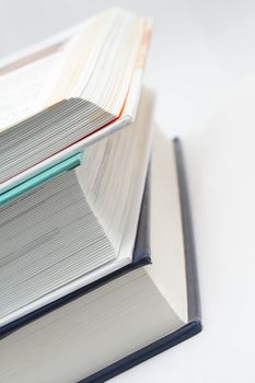 Photo of a stack of three books 