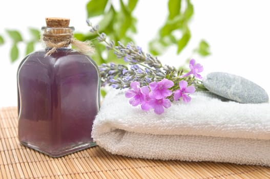 spa still life with perfumes and aromatic herbs
