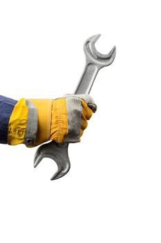    man holding a big wrench over white
