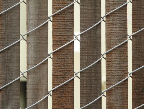 Closeup photo of wooden fence with wire