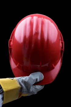 man holding red helmet over black
