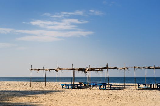 View of exotic bamboo hut on tropical beach