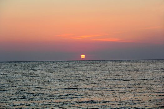 Beautiful evening sea landscape with red sunset