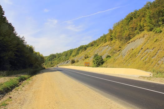 Summer beautiful landscape with Caucasus mountains and road