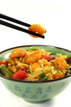 Rice with asian shrimp in asian dishes