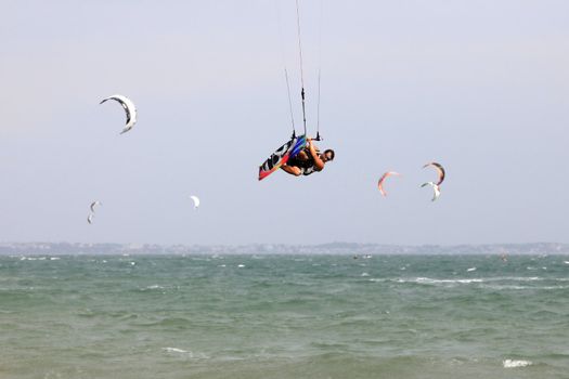 Kiteboarder enjoy surfing in water. Vietnam