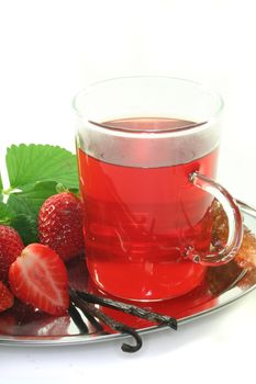 Strawberry tea with fresh strawberries and vanilla