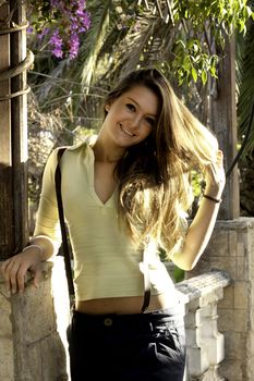 View of a beautiful blond woman posing on a fashionable way.