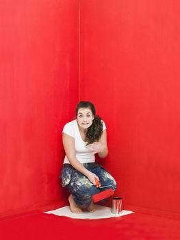 Girl has painted herself in the corner