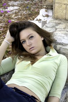 View of a beautiful blond woman posing on a fashionable way.