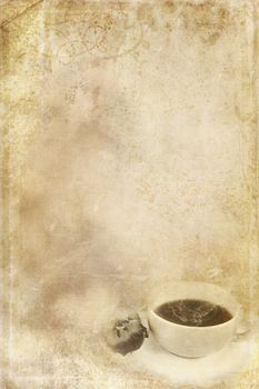 Textured paper background with steaming cup of coffee in lower corner and copy space.