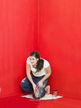 Girl has painted herself in the corner