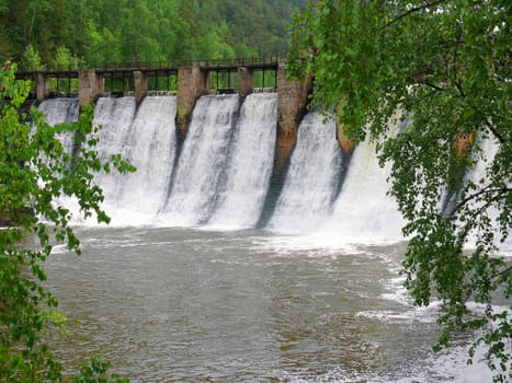 anthropogenic waterfall in satka river - Ural