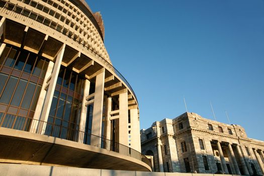 New Zealands parliament buildings with the colloquially known Beehive in foreground.