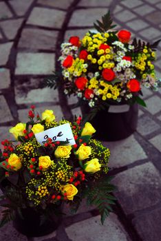 Bouquets of roses and other flowers on farmers market in Perigueux, France