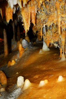 Rock formations inside of a cave in Dordogne region, France.