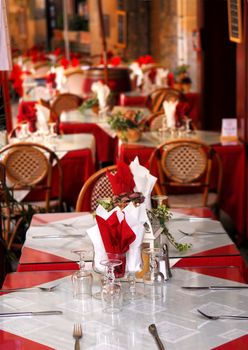 Outdoor restaurant patio on the street of Sarlat, Dordogne region, France