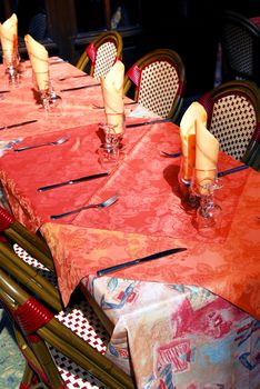 Set table with tablecloth and glasses on restaurant outdoor patio